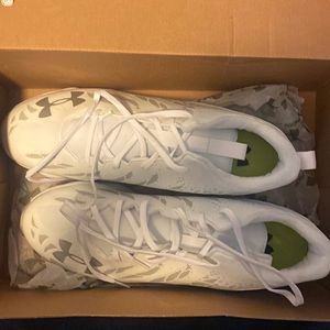 •Under armor •Lightly used cleats •Sz 13